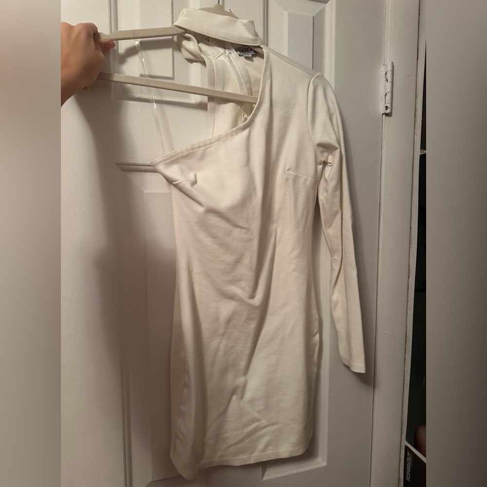 Fashion Nova white one-shoulder top with a relaxed fit